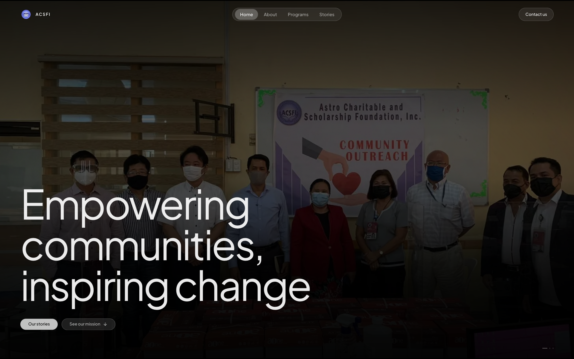 ACSFI homepage with a community outreach photograph and the message Empowering communities, inspiring change